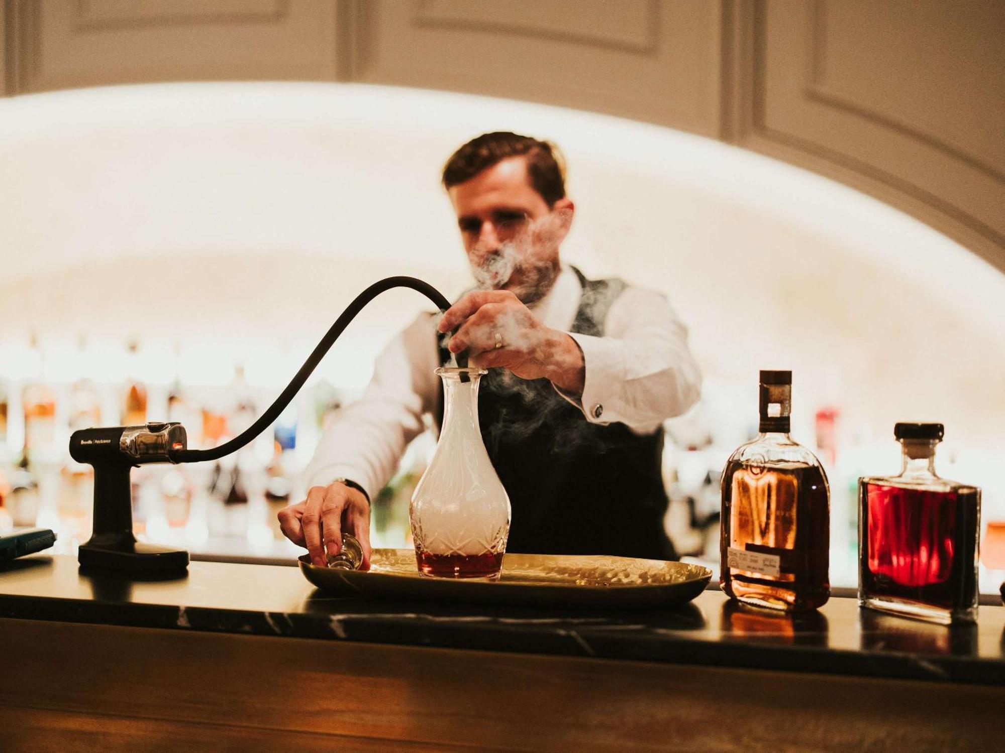 The Playford Adelaide - Mgallery Bagian luar foto A bartender at work