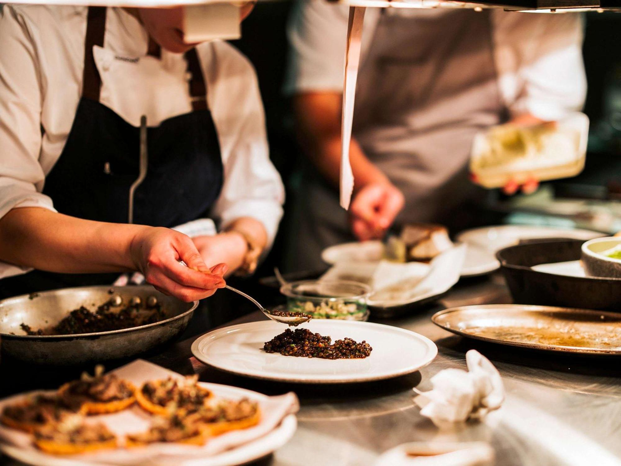 The Playford Adelaide - Mgallery Bagian luar foto A chef plating a dish